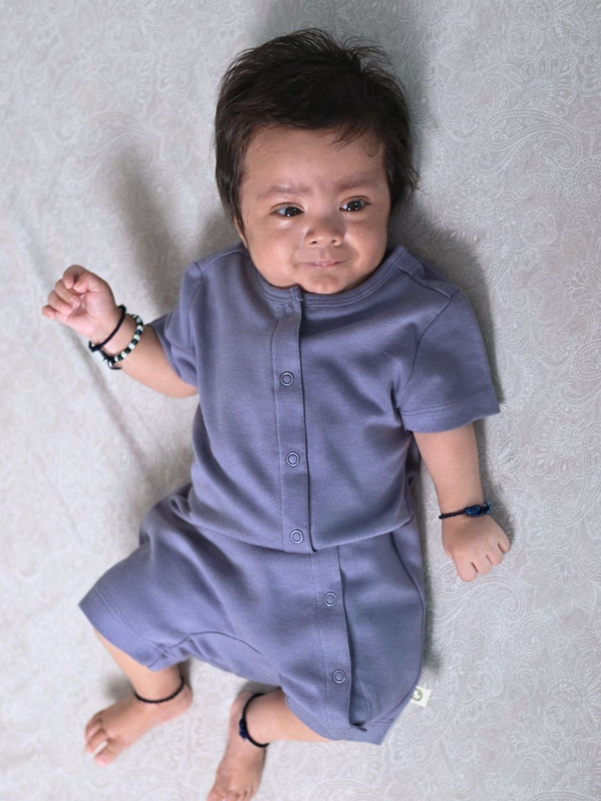 short sleeve bamboo knit romper with snap buttons - blue granite