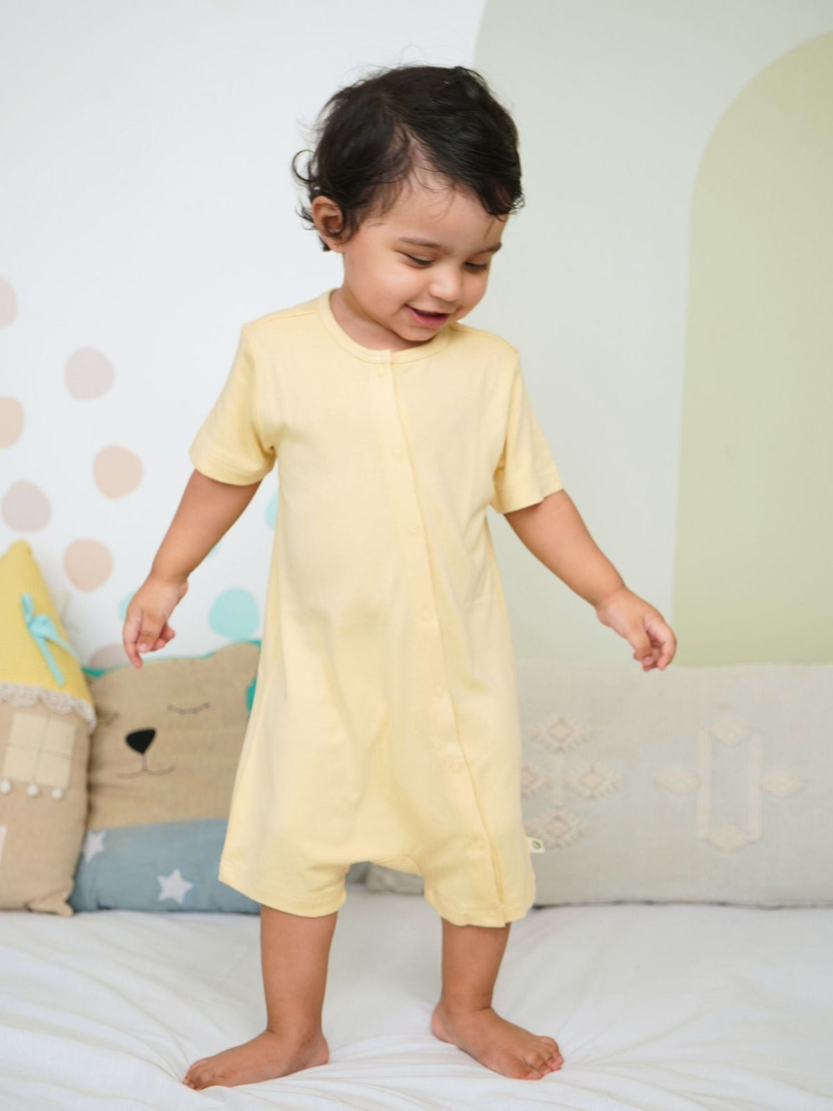 short sleeve bamboo knit romper with snap buttons - corn